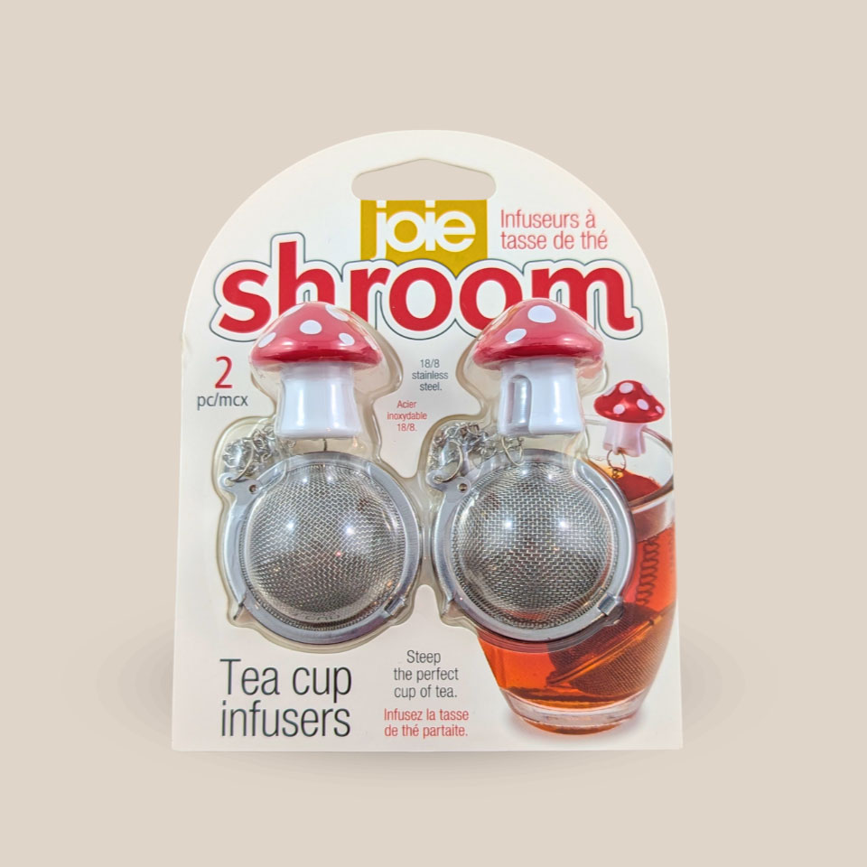 Two mushroom-shaped tea infusers in their packaging